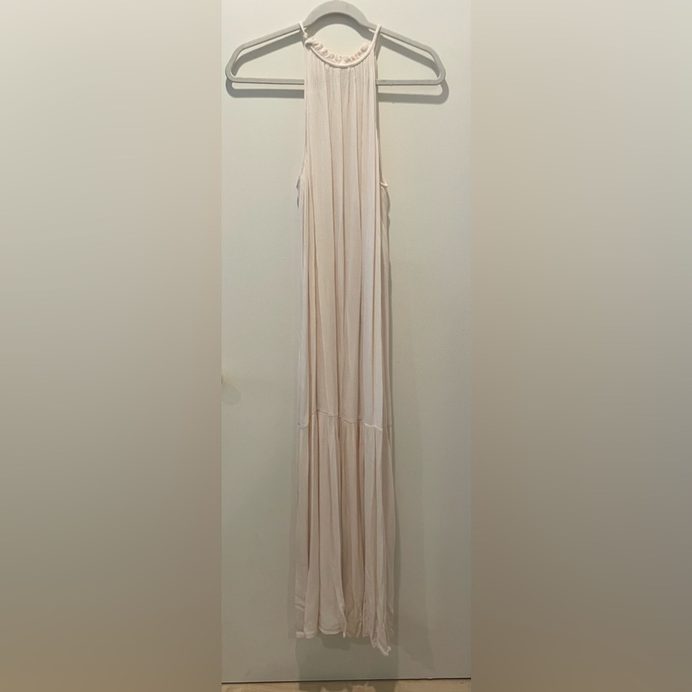 Cream colored sleeveless maxi dress